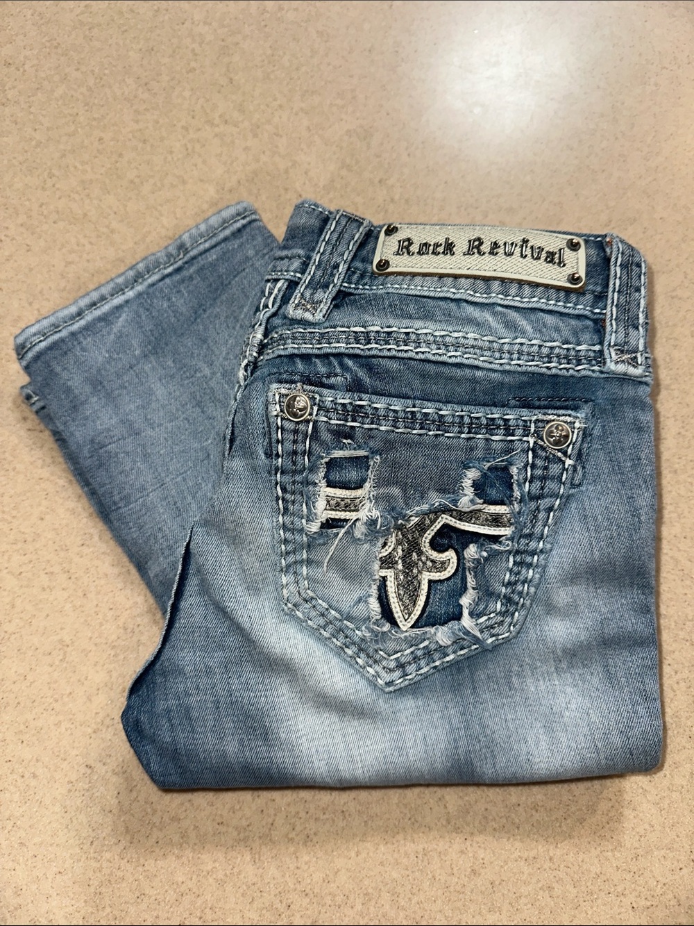 Rock Revival Women’s Light Blue Straight Jeans with Embroidered Pocket